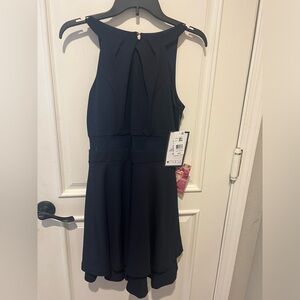 Navy blue size large short party dress. Never worn with tags.